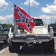 A Confederate flag flown from the back of a pickup at Stewarts Creek High School in Smyrna, Tenn., with the words, "Heritage not Hate"
WKRN-TV